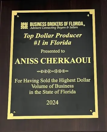Client meeting with Florida business broker during exit planning