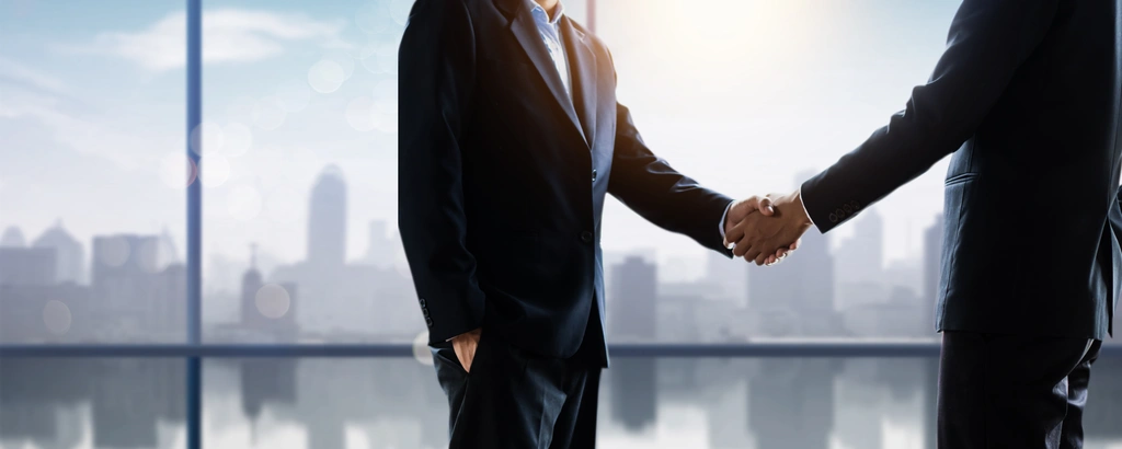 Aniss Cherkaoui, Florida business broker, advising client in Fort Lauderdale office